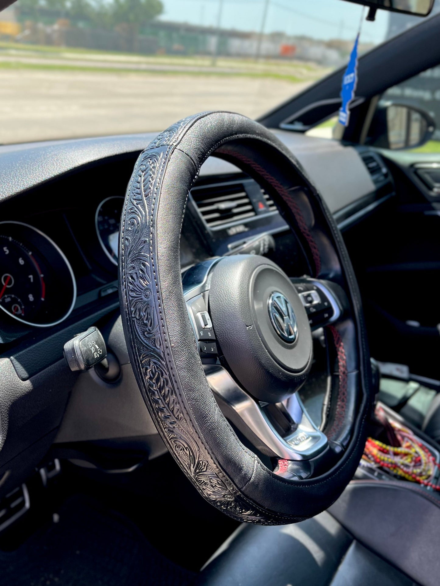 15” black hand tooled steering wheel cover