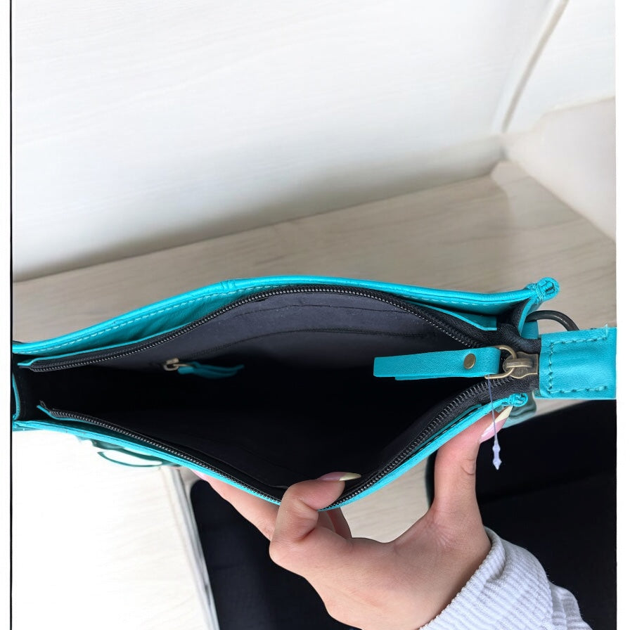 Turquoise tooled leather fringe crossbody bag