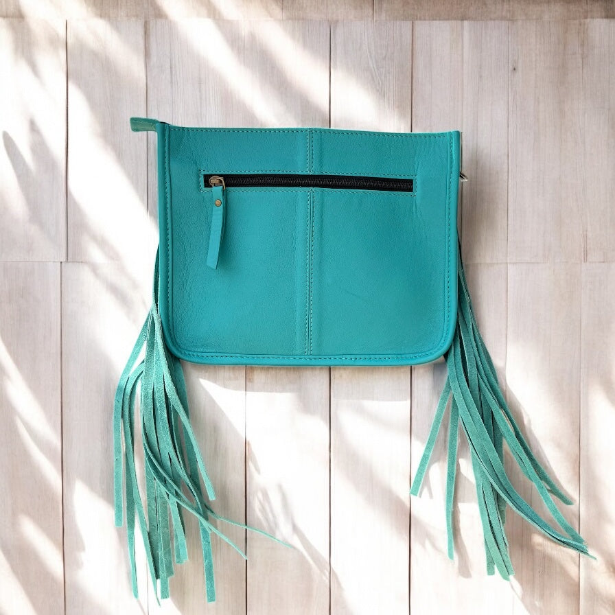 Turquoise tooled leather fringe crossbody bag