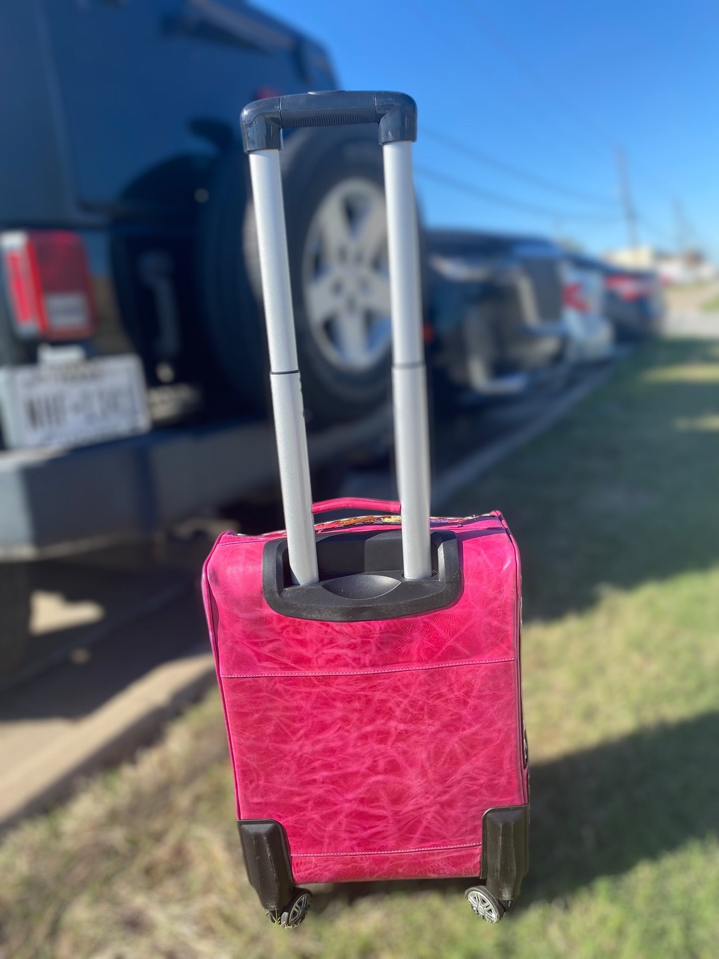 Pink Floral Tooled Leather Rolling Luggage