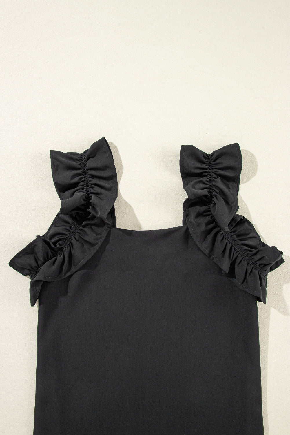 Solid Ruffle Trim Sleeveless Top