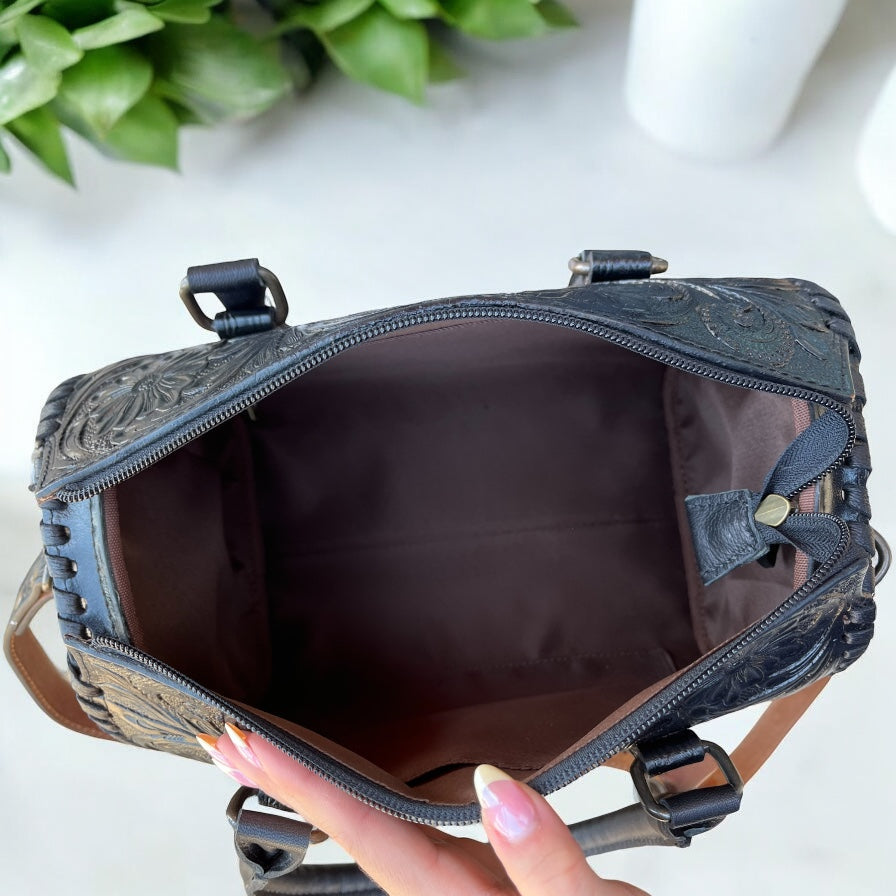 Black floral tooled leather speedy duffle bag