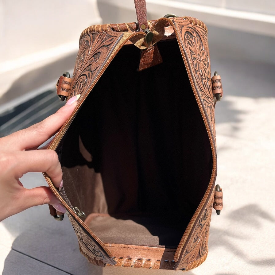 Tan floral tooled leather speedy duffle bag