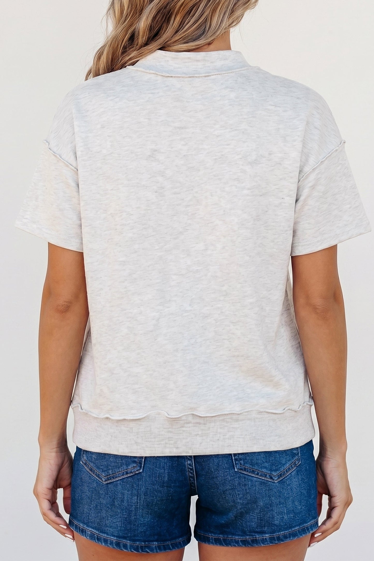 Solid Exposed Seam Mock Neck Tee