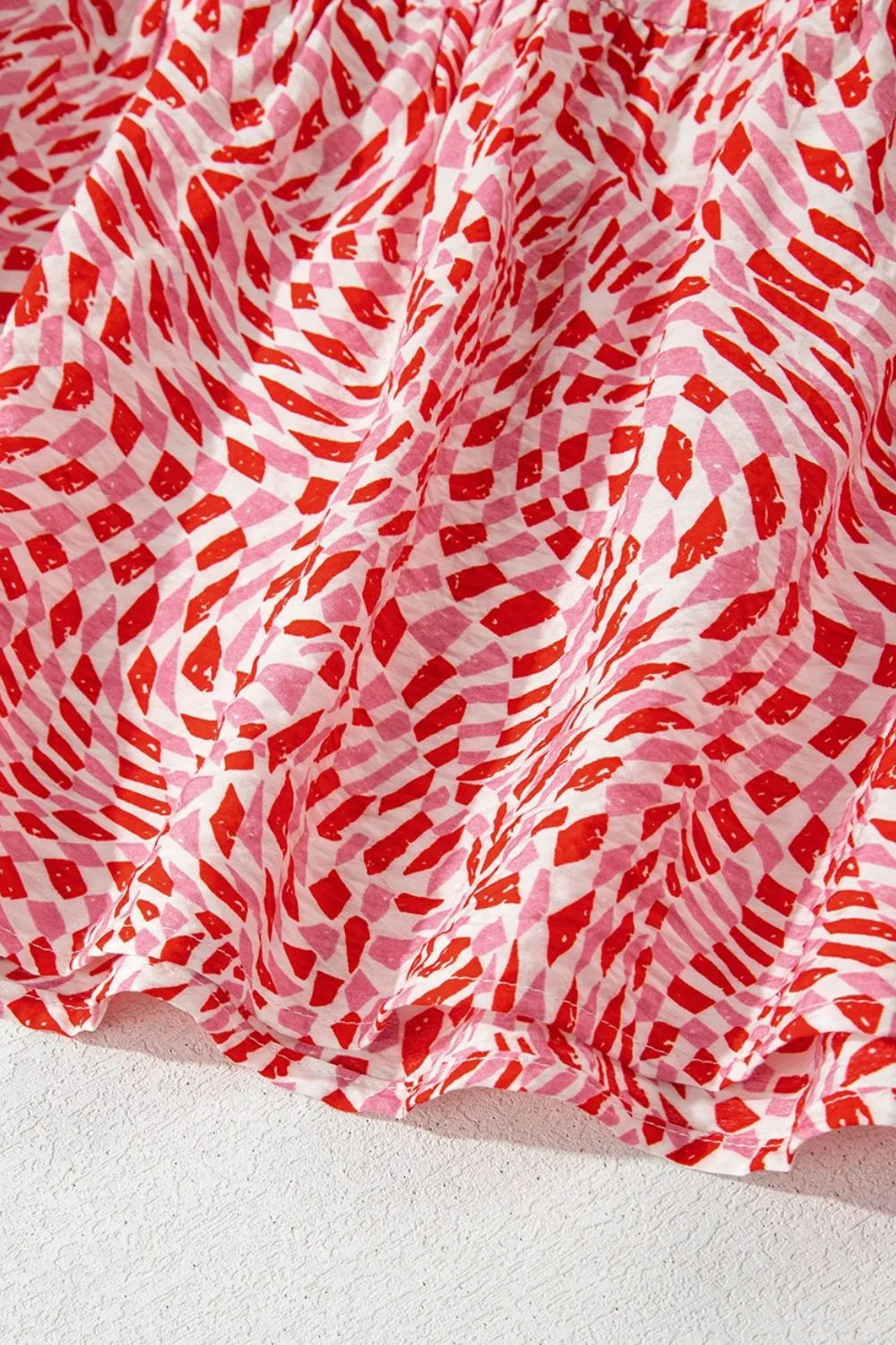 Geometric Print Knot Back Sleeveless Ruffle Hem Dress