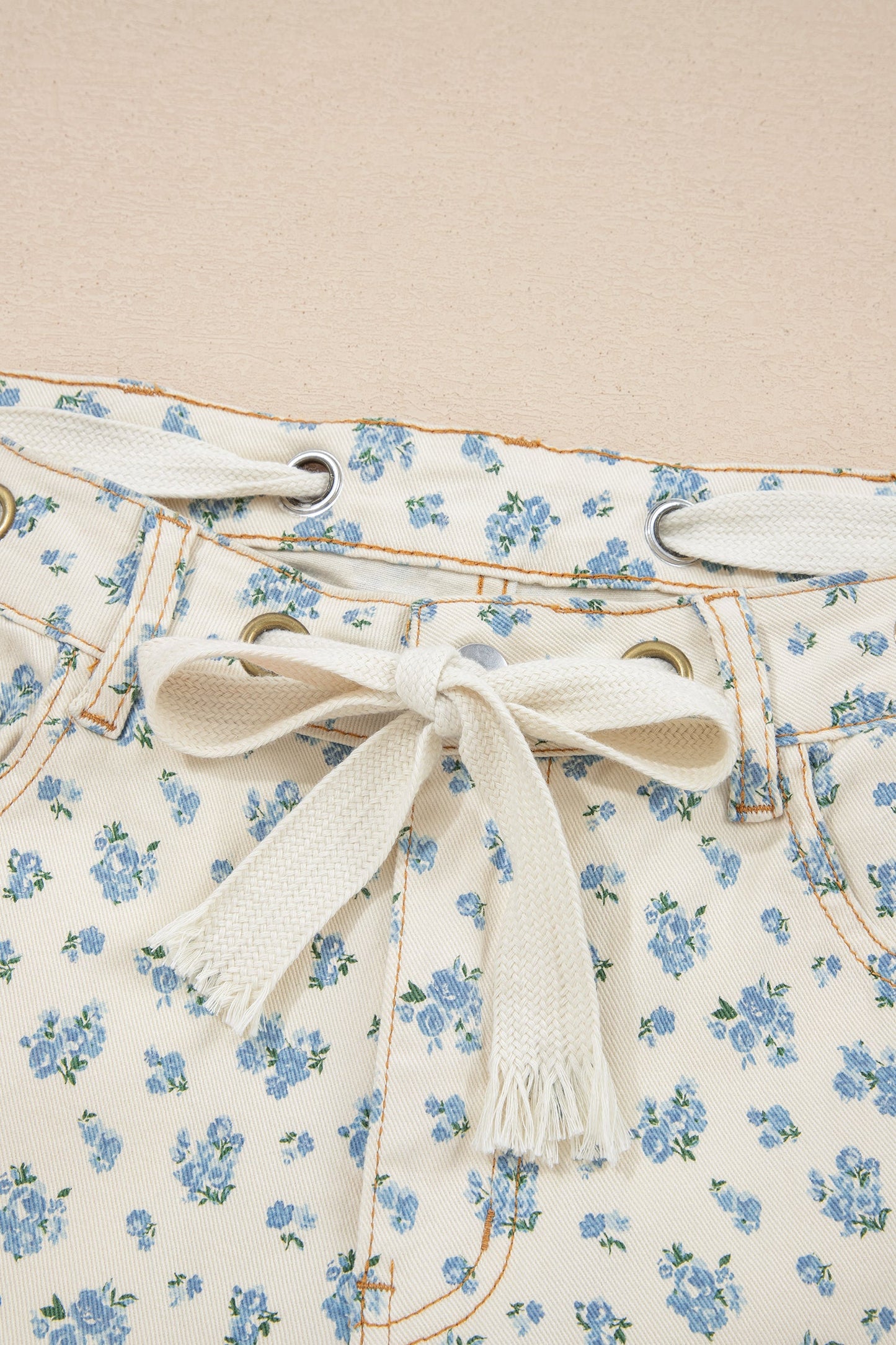 Floral Grommet Knot Waist Barrel Leg Jeans
