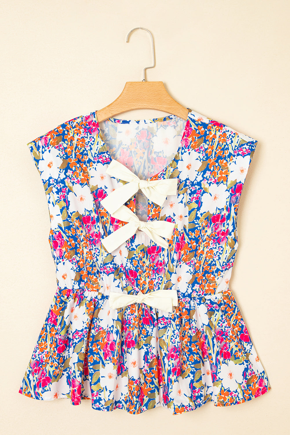 Floral Bow Sleeveless Slit Peplum Blouse