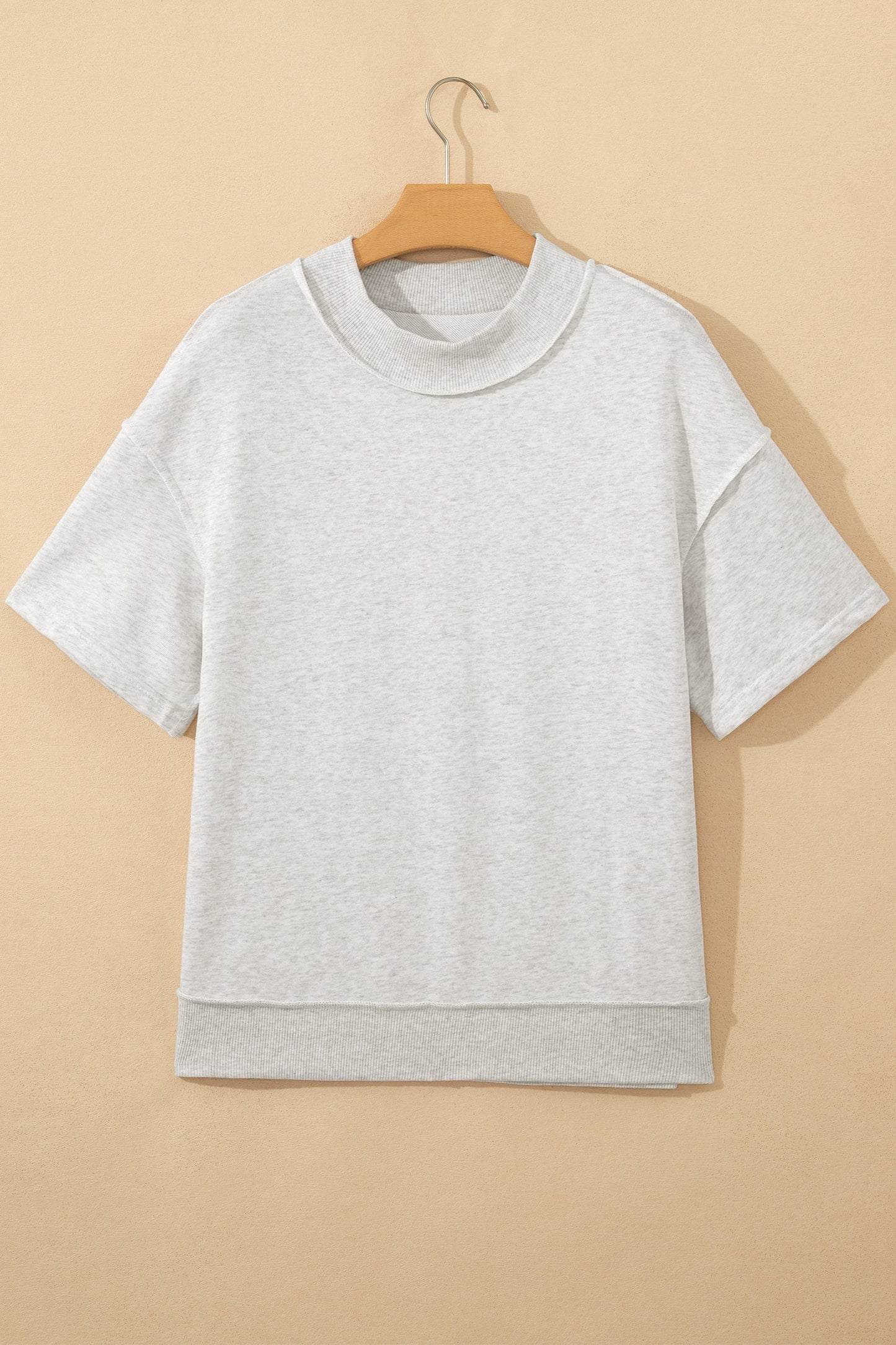 Solid Exposed Seam Mock Neck Tee