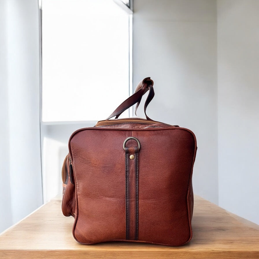 Basketweave tooled leather duffle bag