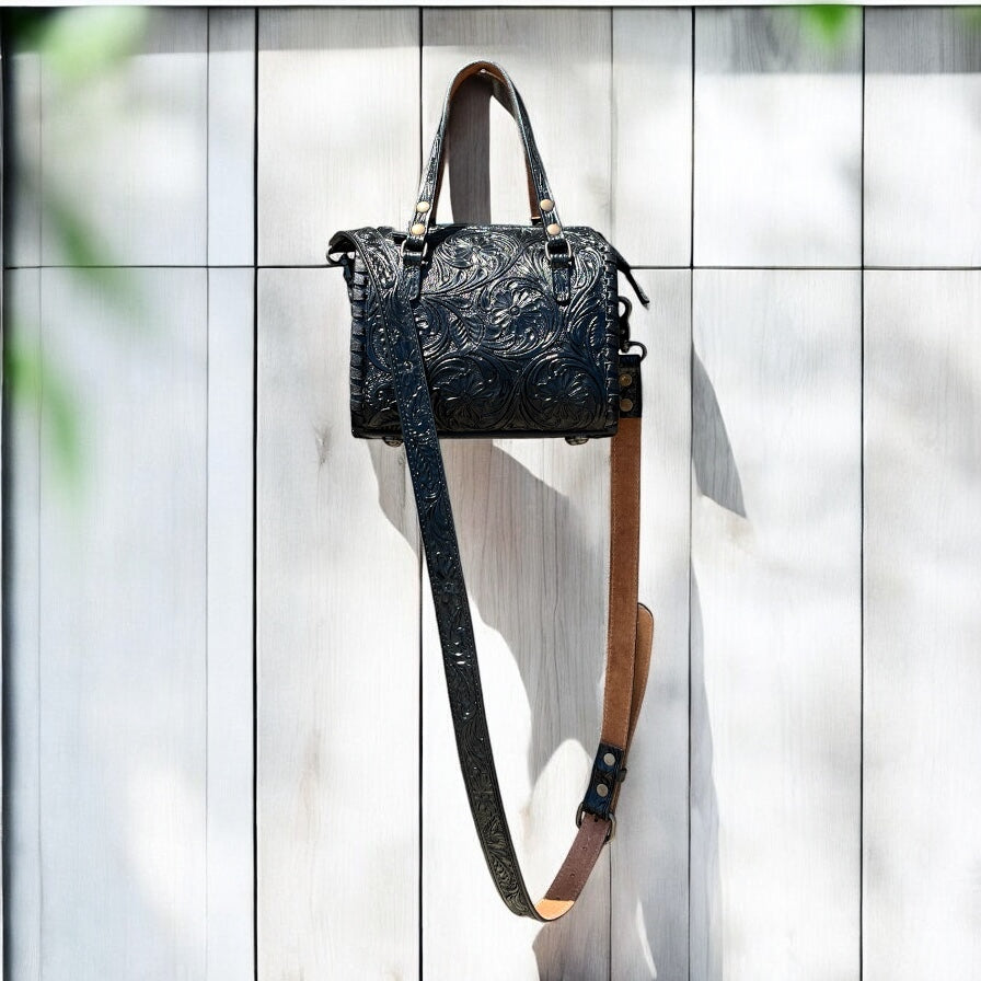 Black floral tooled leather speedy duffle bag