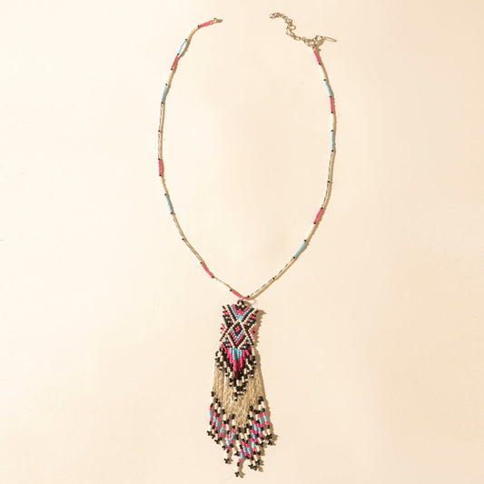 Myra Sky and Coral in necklace in Turquoise