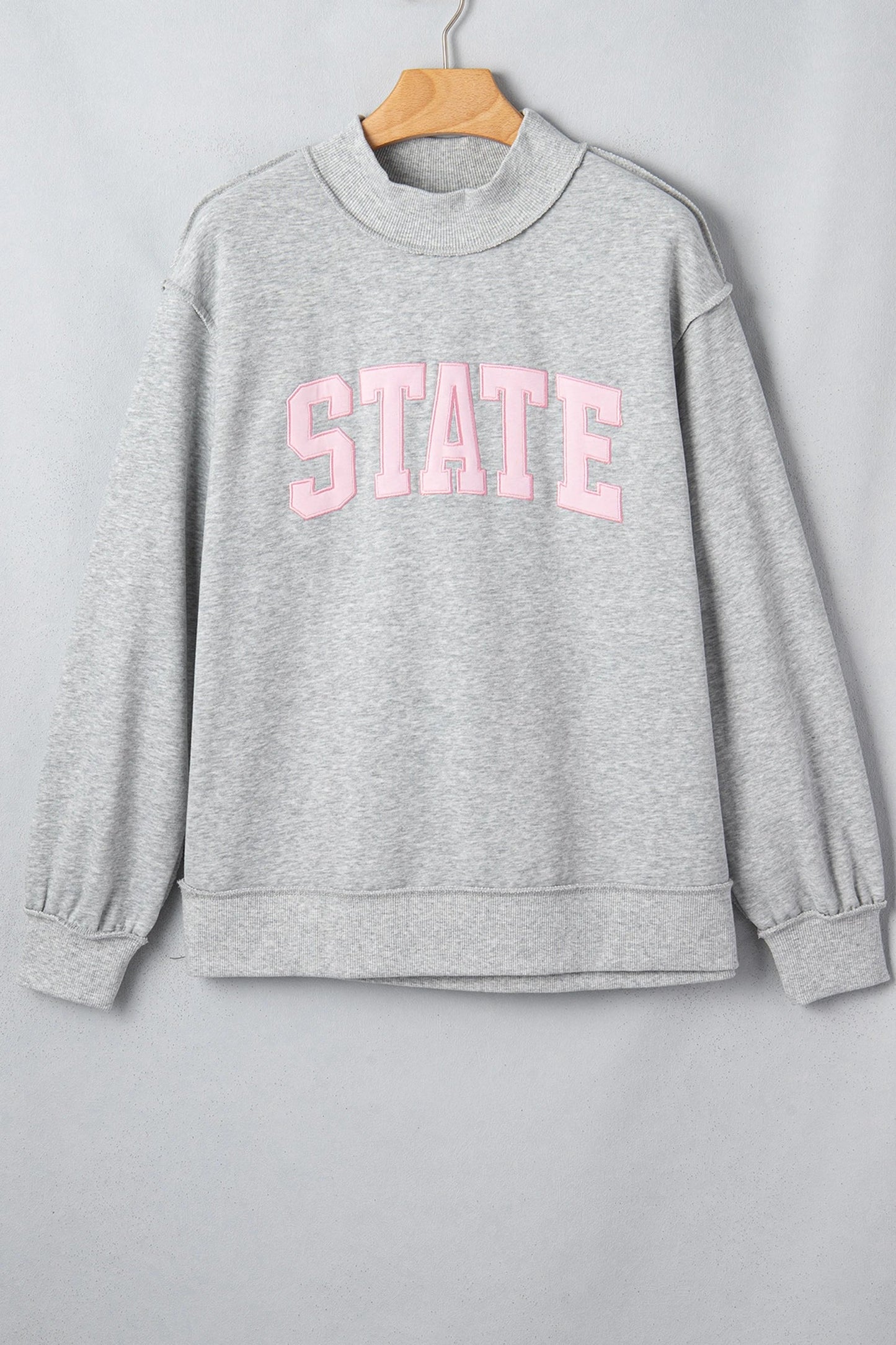 STATE Embroidered Exposed Seam Mock Neck Sweatshirt