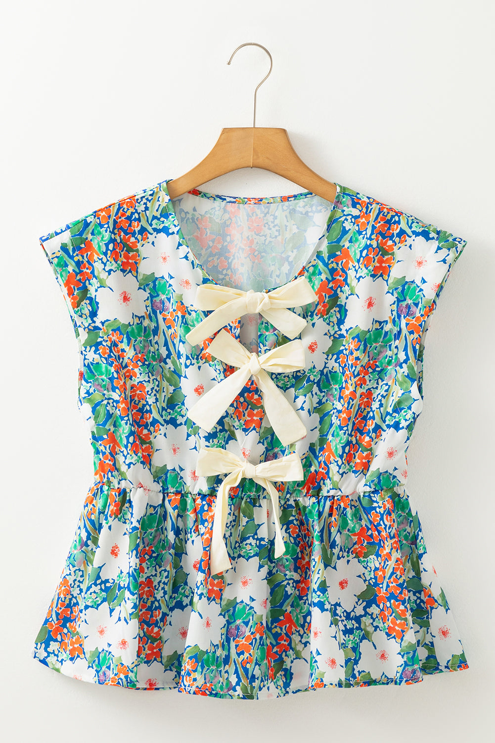 Floral Bow Sleeveless Slit Peplum Blouse