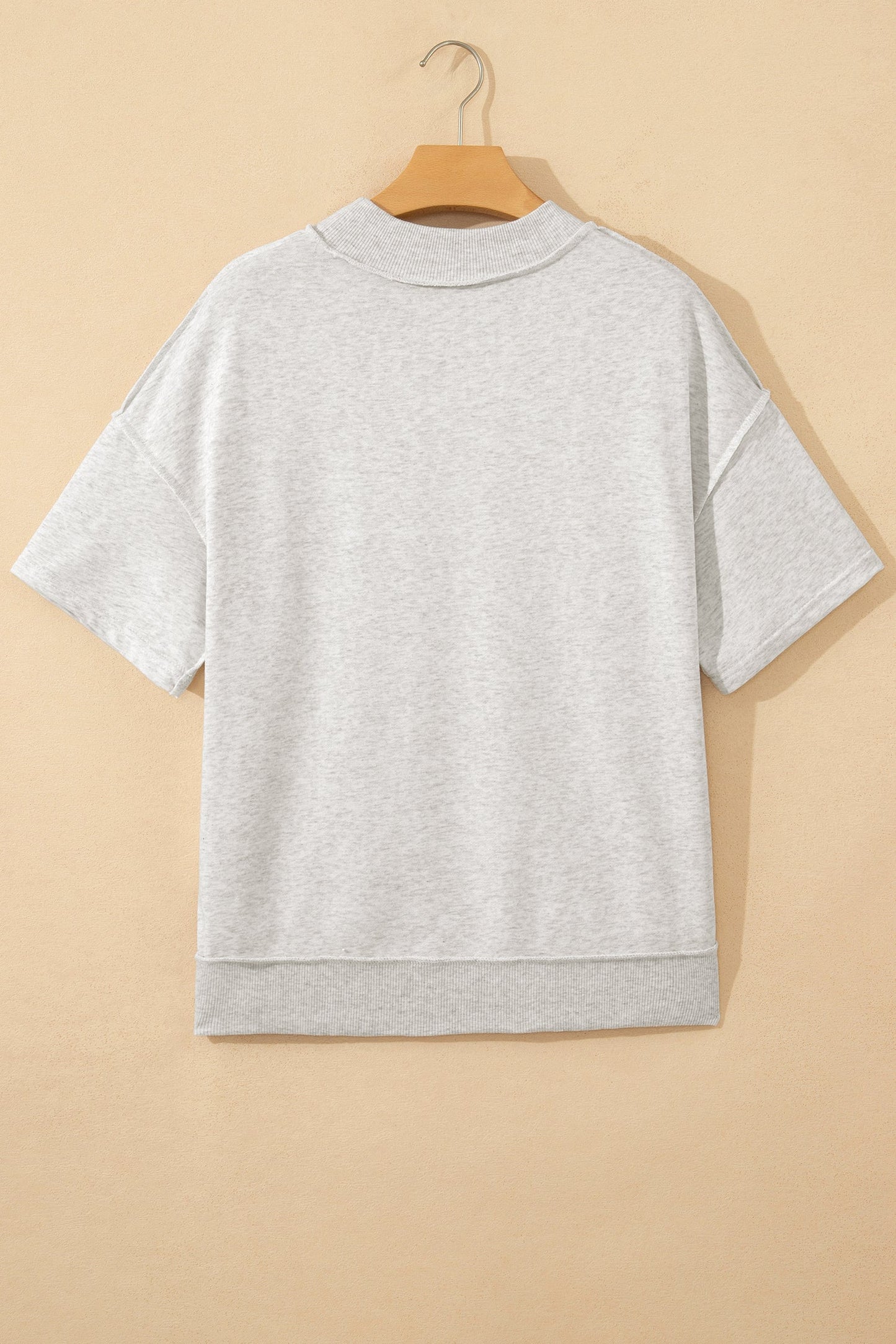 Solid Exposed Seam Mock Neck Tee